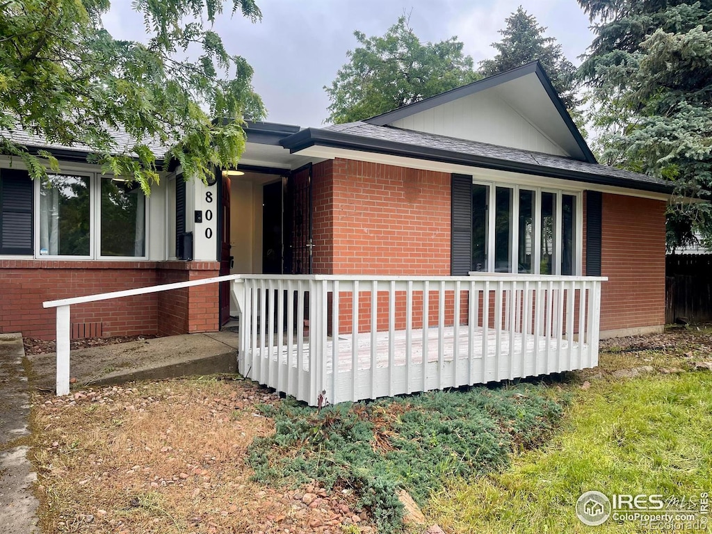 800 Mohawk Dr, Boulder, CO 80303 - ranch-style house with brick siding and a porch