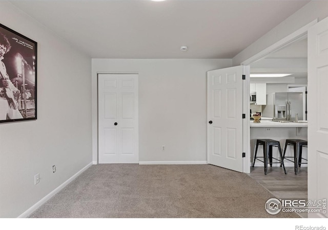 800 Mohawk Dr, Boulder, CO 80303 - carpeted empty room featuring baseboards