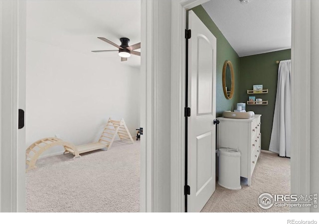 1718 101st Avenue Ct, Greeley, CO 80634 - laundry room with carpet flooring and a ceiling fan
