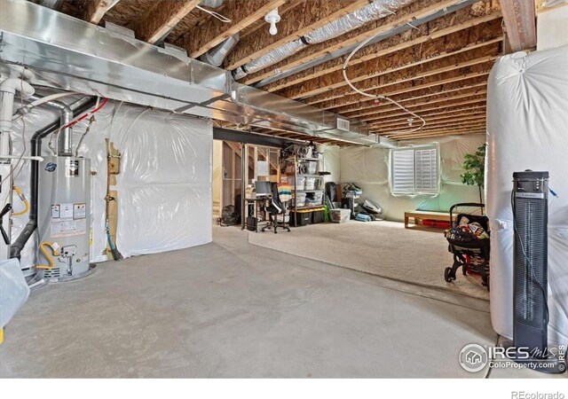 1718 101st Avenue Ct, Greeley, CO 80634 - unfinished basement featuring water heater