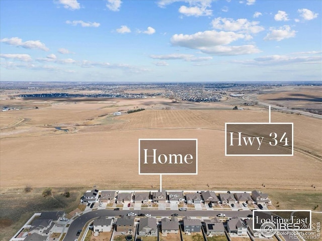 1718 101st Avenue Ct, Greeley, CO 80634 - aerial view of property and surrounding area featuring nearby suburban area