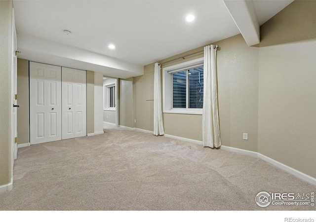2133 Indian Peaks Cir, Longmont, CO 80504 - unfurnished bedroom with carpet flooring, recessed lighting, and a closet