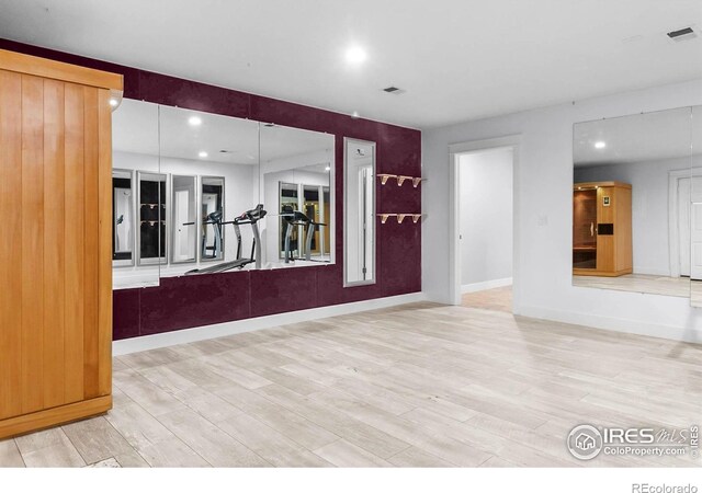 9139 County Road 54, Milliken, CO 80543 - unfurnished room with recessed lighting, wood finished floors, and baseboards