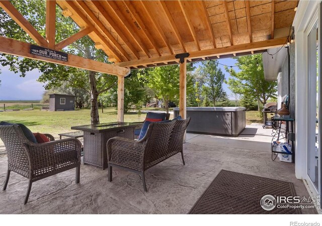 9139 County Road 54, Milliken, CO 80543 - view of patio / terrace featuring a hot tub