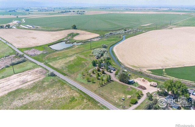 9139 County Road 54, Milliken, CO 80543 - aerial view of property's location with rural landscape and a nearby body of water