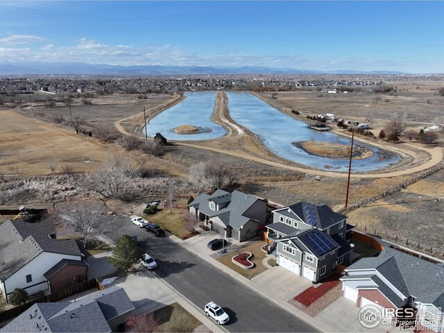 5895 E Conservation Dr, Frederick, CO 80504 - aerial view of residential area featuring a nearby body of water