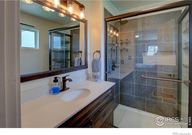 204 35th St SW, Loveland, CO 80537 - bathroom with vanity and a stall shower