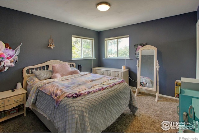 204 35th St SW, Loveland, CO 80537 - bedroom featuring carpet and baseboards