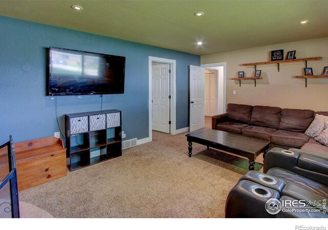 204 35th St SW, Loveland, CO 80537 - living room featuring carpet flooring, recessed lighting, and baseboards