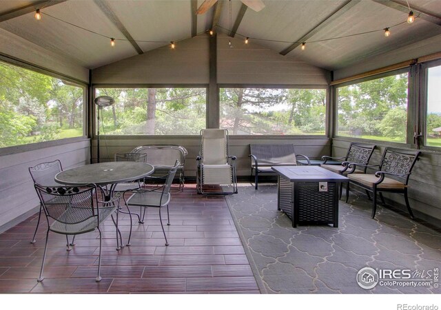 204 35th St SW, Loveland, CO 80537 - sunroom / solarium with plenty of natural light, outdoor lounge area, and outdoor dining space