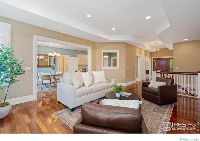 1926 Crested Butte Ct, Loveland, CO 80538 - living area featuring a chandelier, light wood-type flooring, baseboards, and recessed lighting