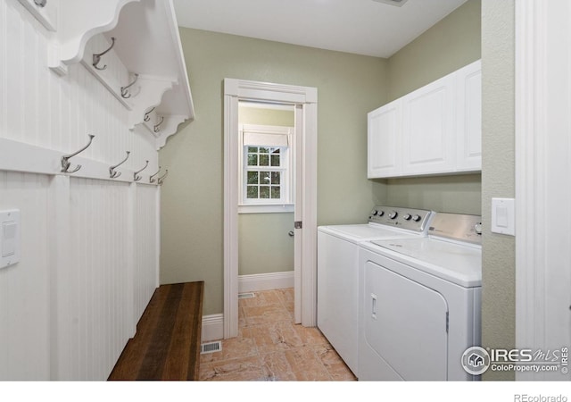 1926 Crested Butte Ct, Loveland, CO 80538 - laundry room with cabinet space, washing machine and clothes dryer, and baseboards