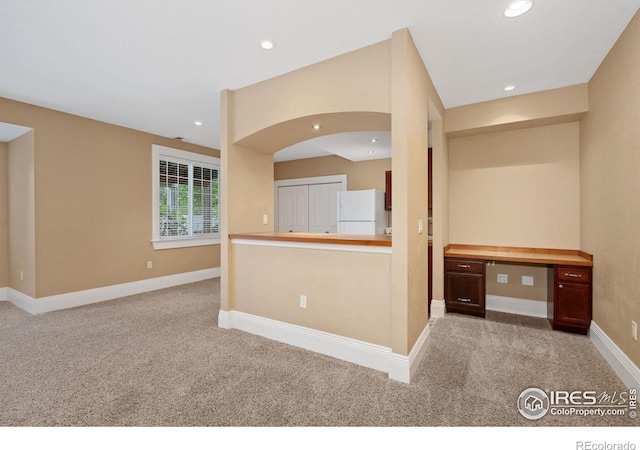 1926 Crested Butte Ct, Loveland, CO 80538 - empty room with carpet, recessed lighting, baseboards, and arched walkways