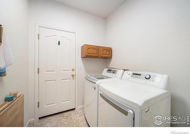 1874 Ute Creek Dr, Longmont, CO 80504 - laundry room with washing machine and dryer and baseboards