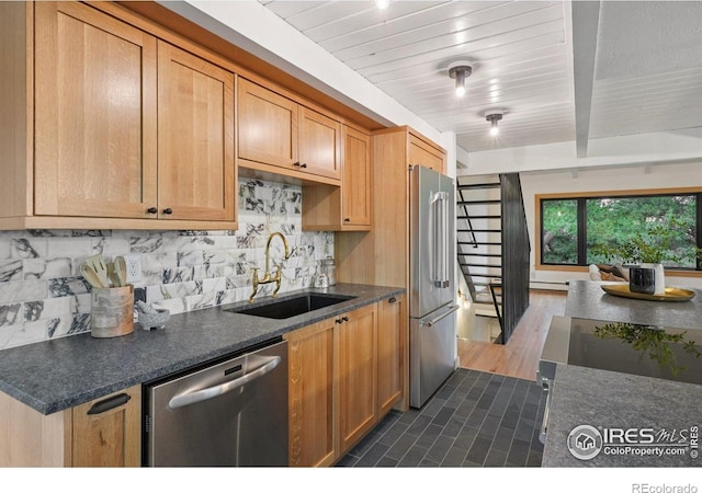 3260 Lafayette Dr, Boulder, CO 80305 - kitchen featuring stainless steel appliances, a sink, tasteful backsplash, and wood ceiling with exposed beams