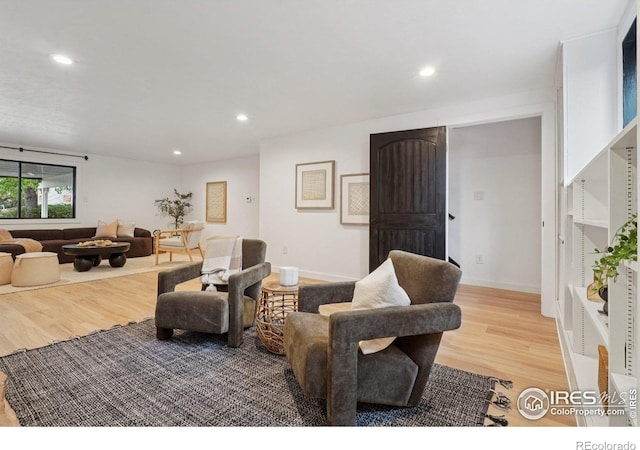 3260 Lafayette Dr, Boulder, CO 80305 - living area with light wood-style flooring, recessed lighting, and baseboards