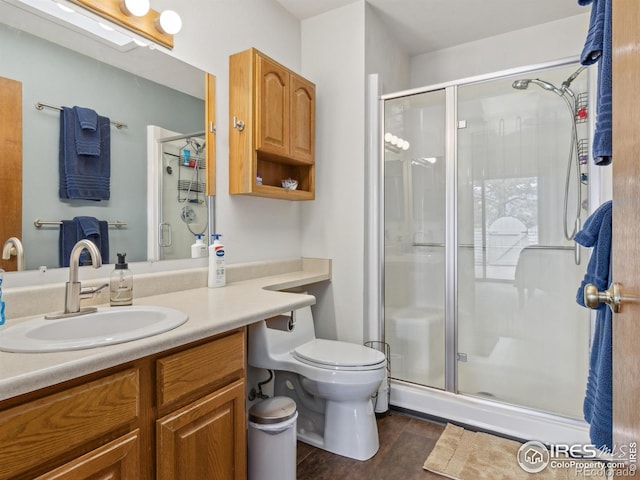 838 Vista Ln, Estes Park, CO 80517 - bathroom with a shower stall, vanity, and toilet