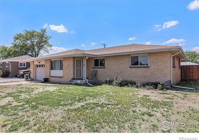 213 S 4th St, La Salle, CO 80645 - single story home featuring a garage and brick siding