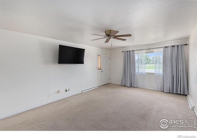 213 S 4th St, La Salle, CO 80645 - empty room with baseboard heating, a ceiling fan, and carpet flooring