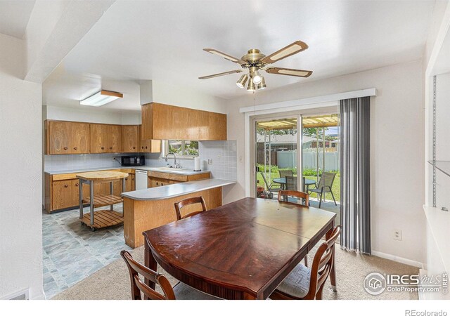 213 S 4th St, La Salle, CO 80645 - dining area featuring a ceiling fan and baseboards