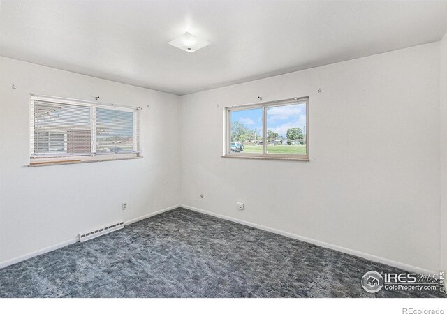 213 S 4th St, La Salle, CO 80645 - carpeted spare room with baseboards