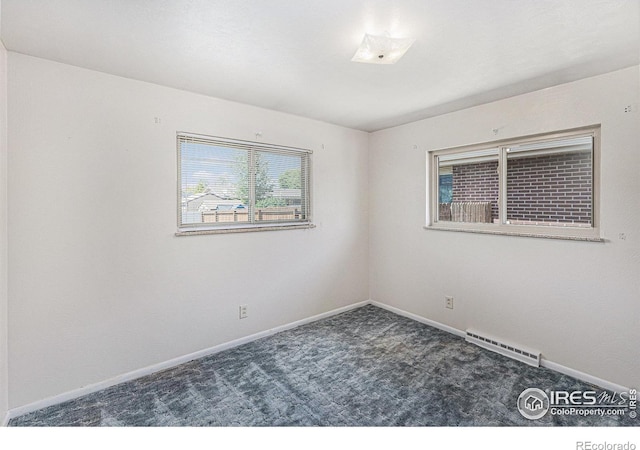 213 S 4th St, La Salle, CO 80645 - empty room with baseboards and carpet floors