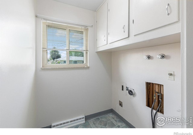 213 S 4th St, La Salle, CO 80645 - laundry room with hookup for an electric dryer, cabinet space, baseboards, hookup for a washing machine, and a baseboard heating unit