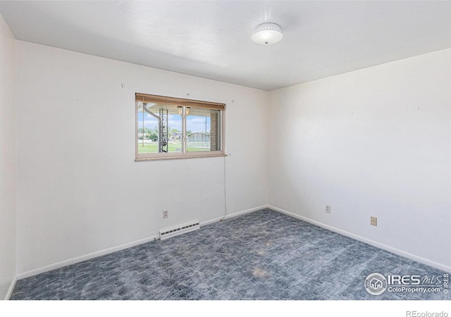 213 S 4th St, La Salle, CO 80645 - carpeted empty room with baseboards