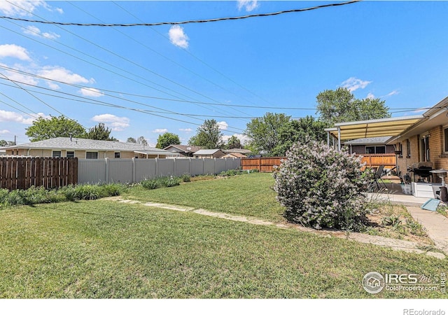 213 S 4th St, La Salle, CO 80645 - view of yard featuring a patio