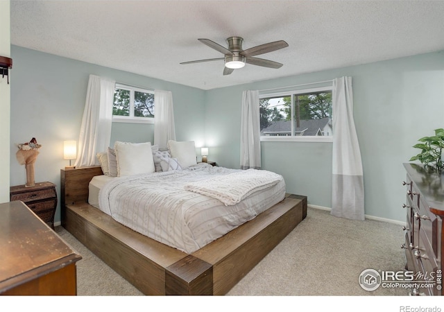 112 Dawson Pl, Longmont, CO 80504 - bedroom featuring carpet, baseboards, and a ceiling fan