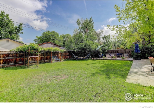 112 Dawson Pl, Longmont, CO 80504 - view of yard with a patio and an outdoor hangout area