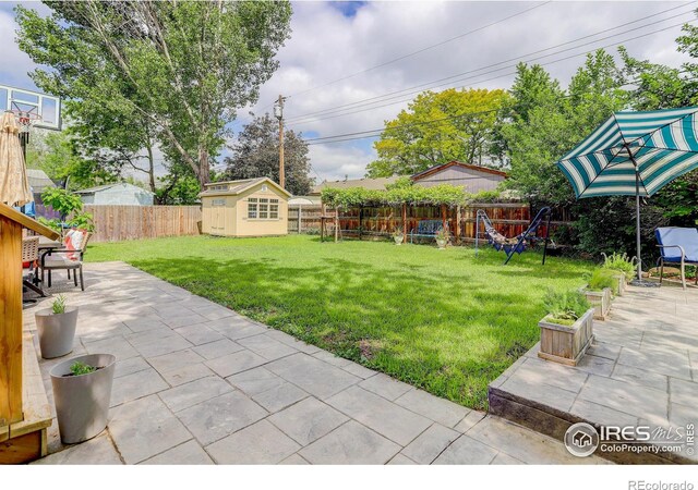 112 Dawson Pl, Longmont, CO 80504 - view of yard featuring a patio area