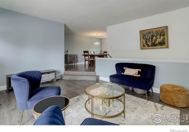 112 Dawson Pl, Longmont, CO 80504 - living area with wood finished floors and baseboards
