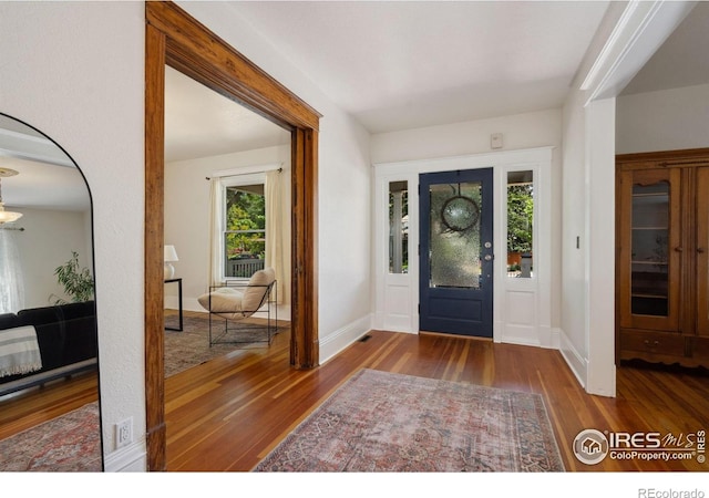 729 Peterson St, Fort Collins, CO 80524 - entryway with wood finished floors and baseboards