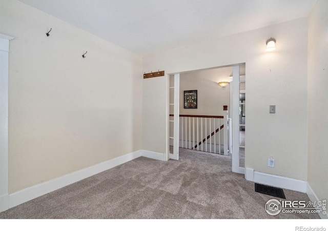 729 Peterson St, Fort Collins, CO 80524 - carpeted spare room featuring baseboards