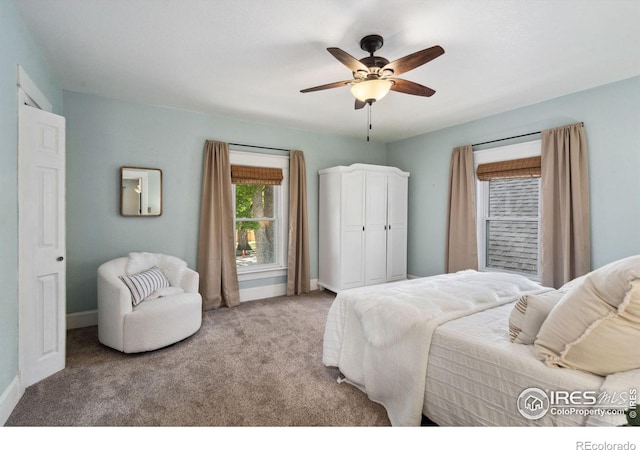 729 Peterson St, Fort Collins, CO 80524 - carpeted bedroom with baseboards and a ceiling fan