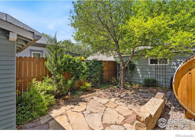 729 Peterson St, Fort Collins, CO 80524 - fenced backyard with a patio