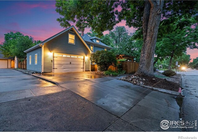 729 Peterson St, Fort Collins, CO 80524 - view of front of home with a garage and concrete driveway