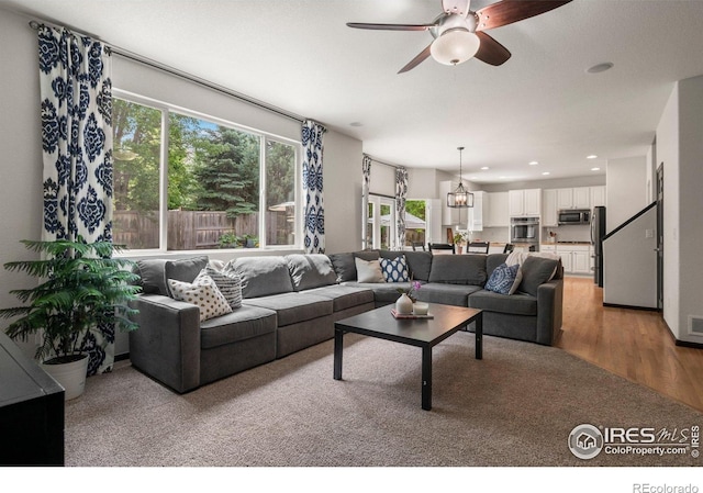 1682 Crestview Ln, Erie, CO 80516 - living room featuring a ceiling fan, light wood-style floors, and recessed lighting