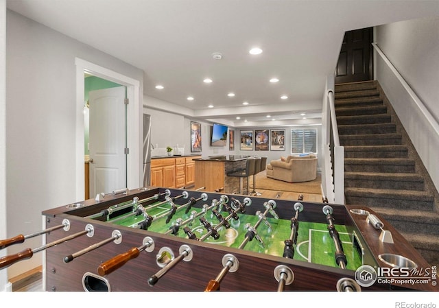 1682 Crestview Ln, Erie, CO 80516 - recreation room with recessed lighting and bar with sink