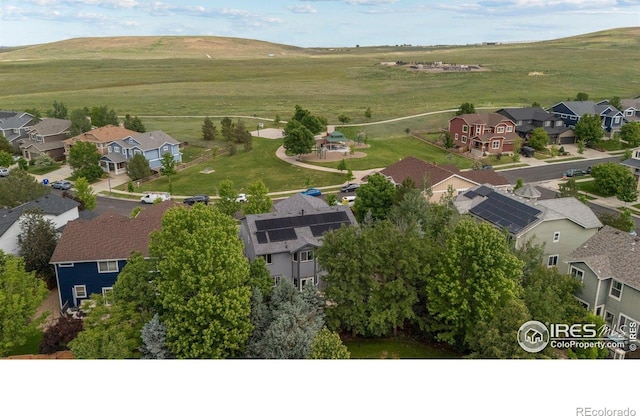 1682 Crestview Ln, Erie, CO 80516 - aerial perspective of suburban area with a mountain backdrop
