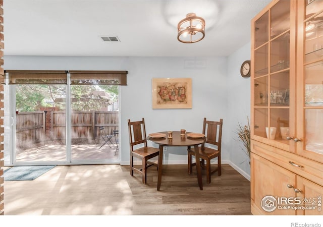 1901 W 101st Ave, Thornton, CO 80260 - dining space featuring wood finished floors and baseboards