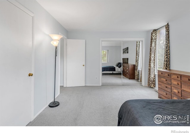1901 W 101st Ave, Thornton, CO 80260 - carpeted bedroom featuring a closet and baseboards