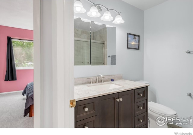 1901 W 101st Ave, Thornton, CO 80260 - full bath with a stall shower, vanity, toilet, and ensuite bath