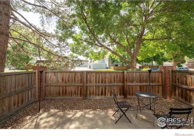 1901 W 101st Ave, Thornton, CO 80260 - fenced backyard with a patio