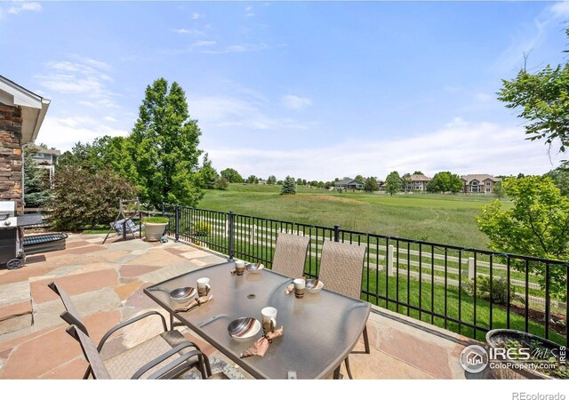 14246 Piney River Rd, Broomfield, CO 80023 - view of patio with outdoor dining area