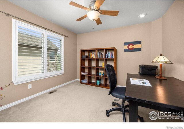 14246 Piney River Rd, Broomfield, CO 80023 - carpeted office space featuring a ceiling fan and baseboards