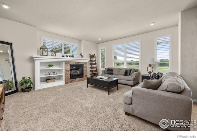 14246 Piney River Rd, Broomfield, CO 80023 - living area with recessed lighting, healthy amount of natural light, and a tiled fireplace