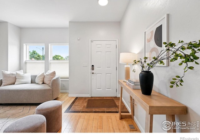 4039 N Clay St, Denver, CO 80211 - entryway featuring hardwood / wood-style flooring and baseboards