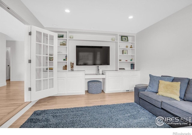 1067 W Alder St, Louisville, CO 80027 - living room featuring light wood-style floors and recessed lighting